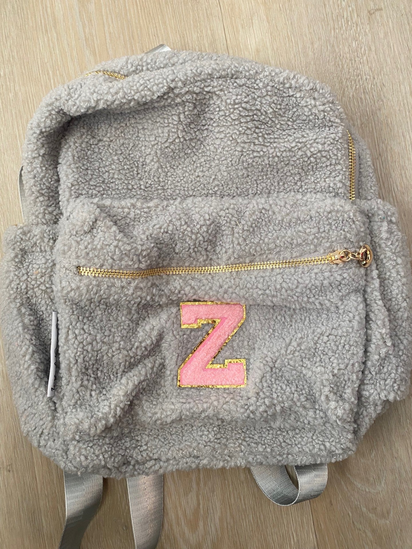 Grey with Initial 'Z' in pink **SLIGHT TEAR ON SIDE POCKET**